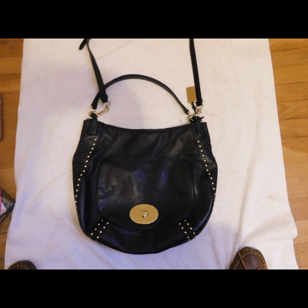 Black coach turnlock leather purse